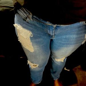 Distressed jeans.